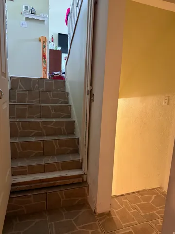 Staircase with tile treads and risers