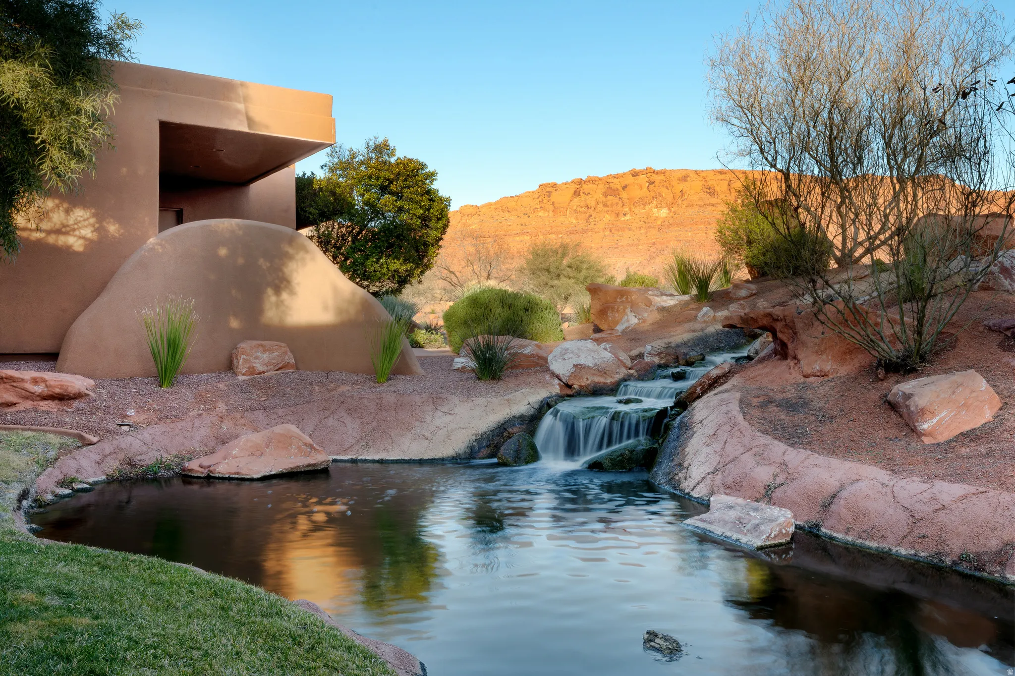 Southwest-style architecture featuring stucco exterior