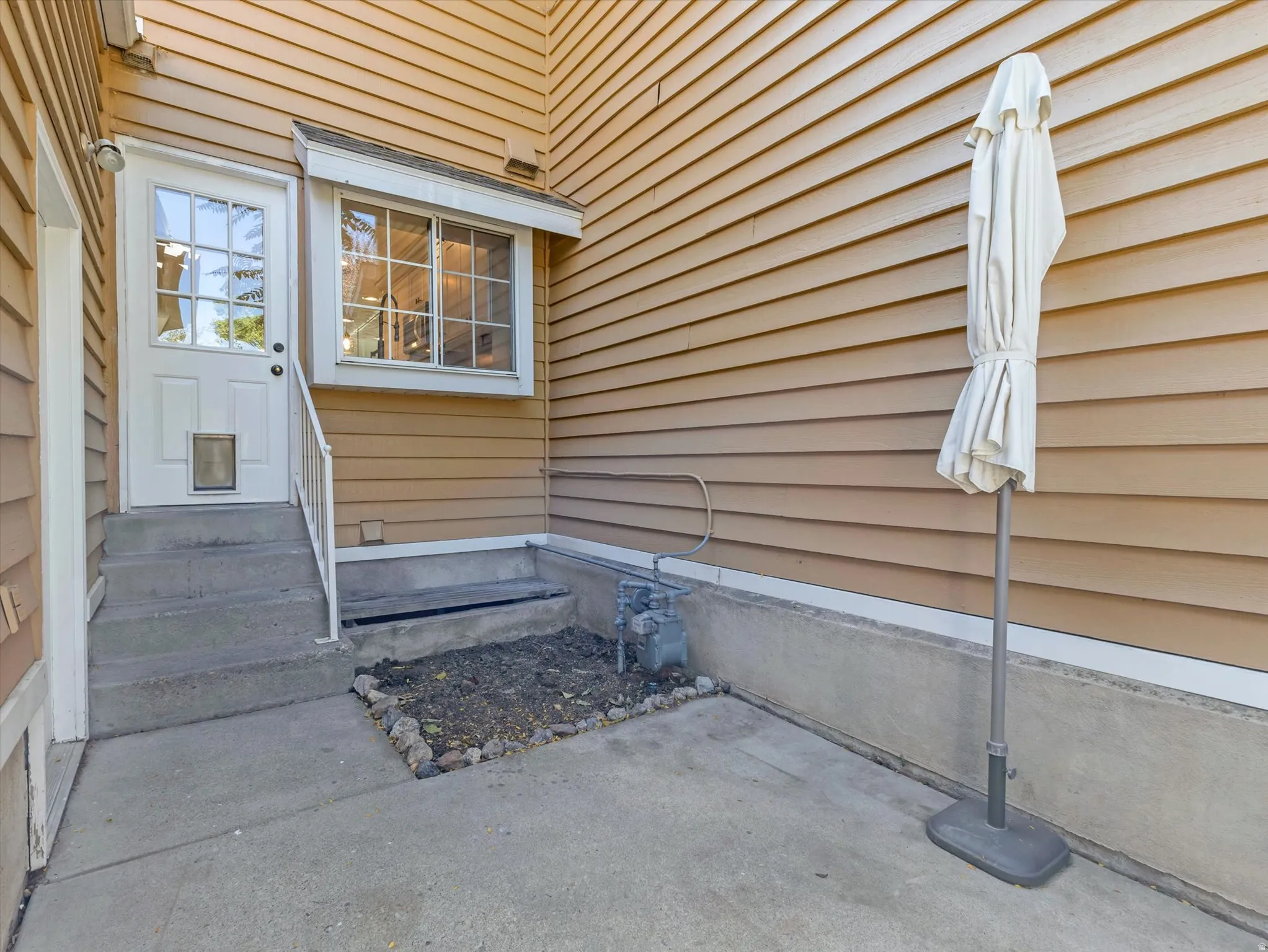 Private patio off the kitchen and garage.