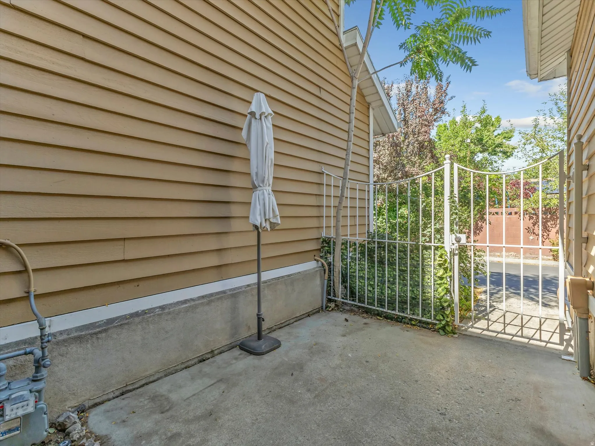 Private patio off the kitchen and garage.