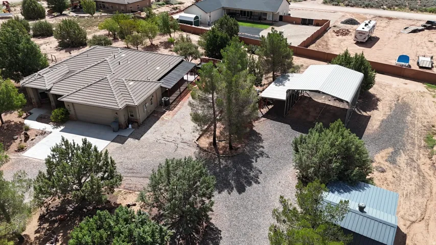 Single-story residence with a tiled roof, attached garage, and covered patio