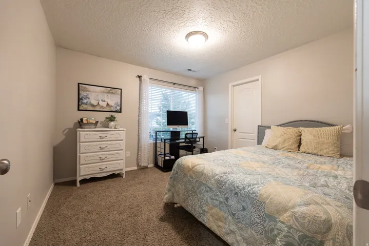 Upstairs bedroom 3 is spacious with a walk-in closet