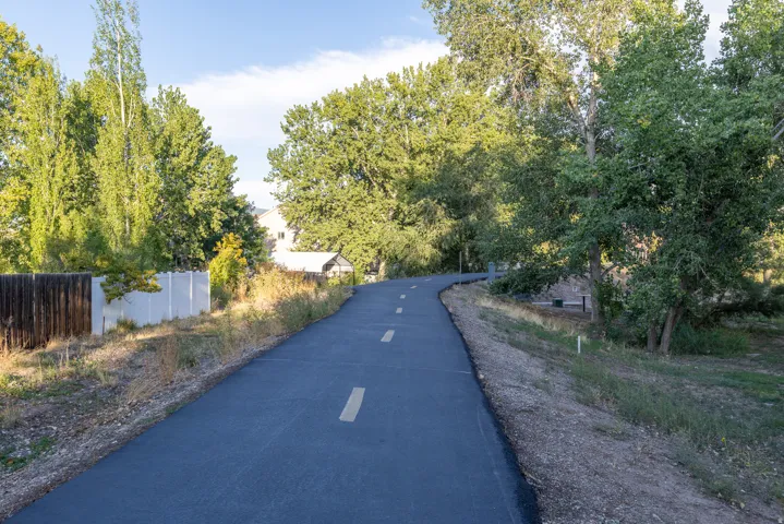 Spanish Fork River Trail boardered with mature trees and you'll find gorgeous views