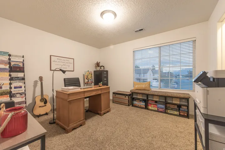 Upstairs bedroom 4 / office is spacious with a walk-in closet