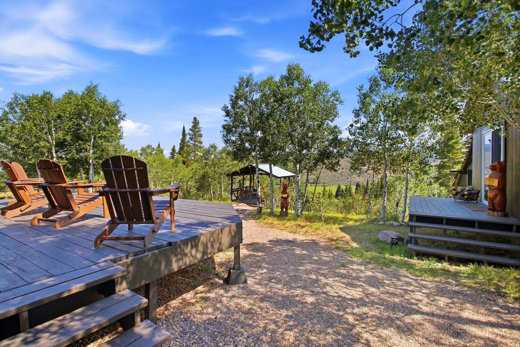 Expansive outdoor deck with natural wood-tone decking