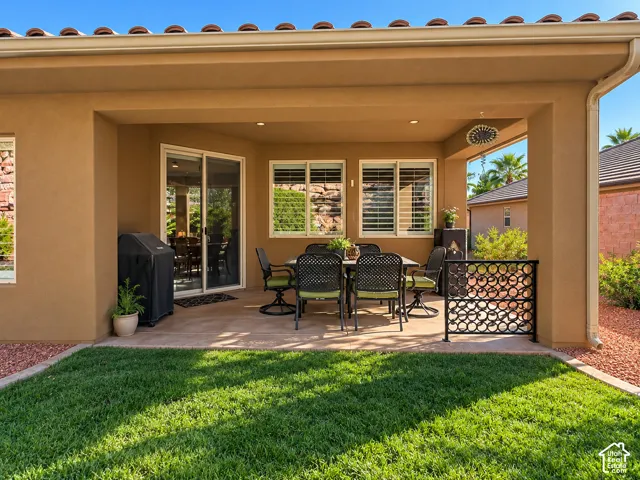 Back patio. AI altered to move BBQ against the house