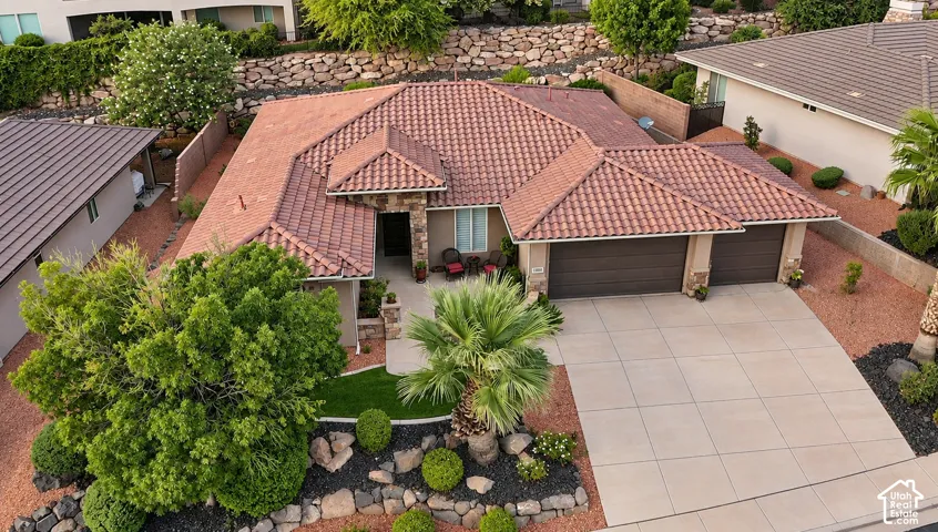 Terracotta tile roof, stucco Southwestern style, mature landscape