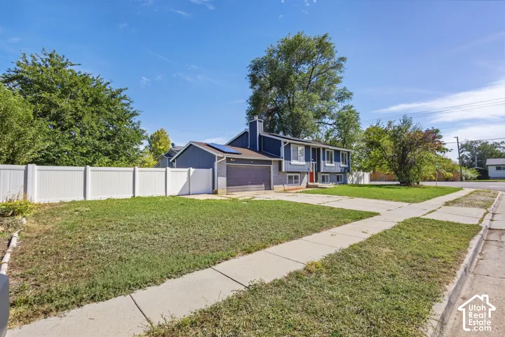 Blue exterior siding with white trim