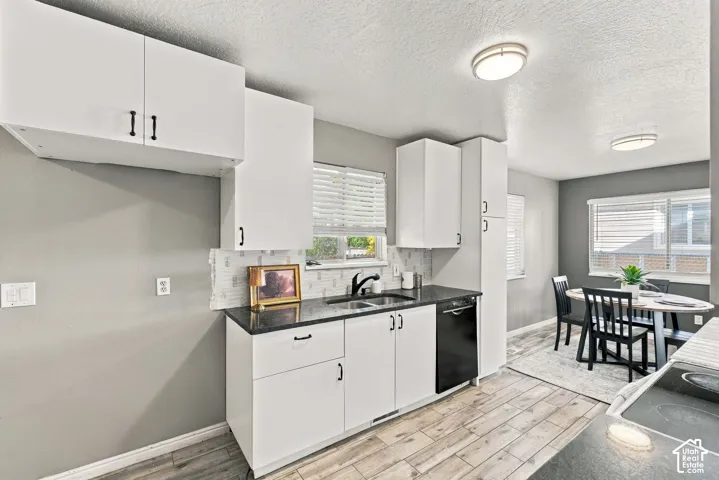 White cabinetry with black hardware