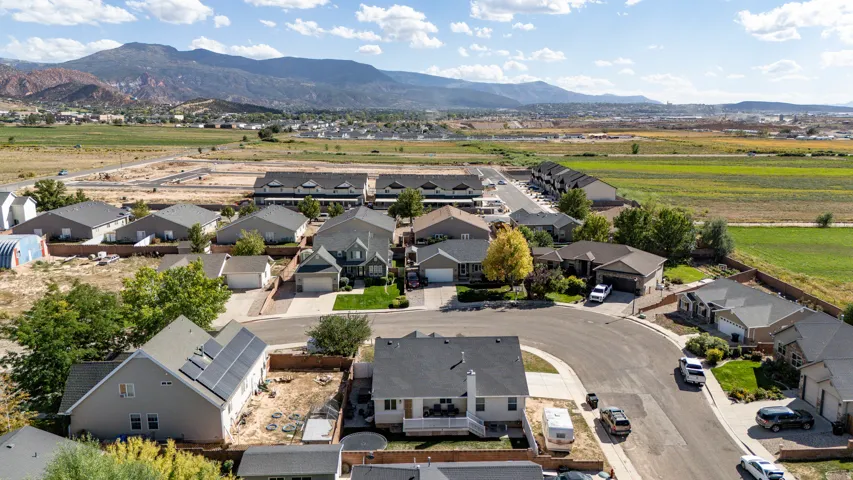 Residential neighborhood featuring single-story homes, multi-story residences, and townhomes
