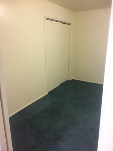 Bedroom closet. Photo shown was taken prior to tenant occupancy and is provided for reference.