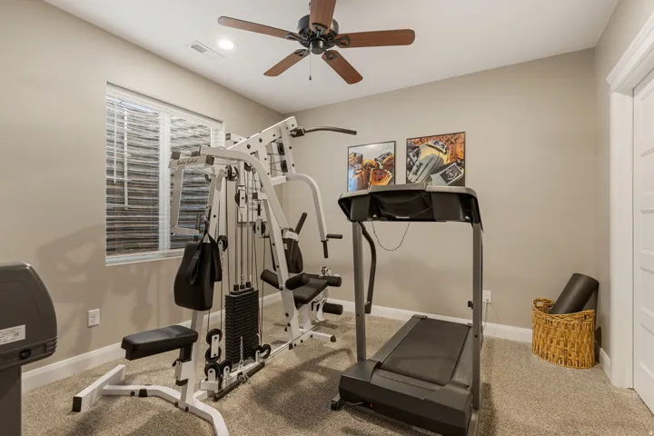 Recessed lighting, ceiling fan, white trim, window with blinds, and neutral wall paint