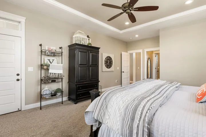 Tray ceiling with recessed lighting and crown molding