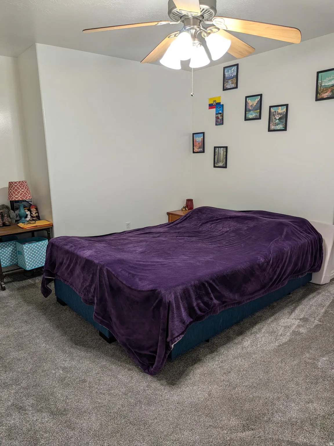 Recessed lighting, ceiling fan with light kit, and gray carpet