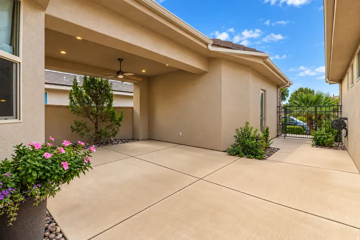 Covered patio featuring recessed lighting, a ceiling fan, and concrete flooring