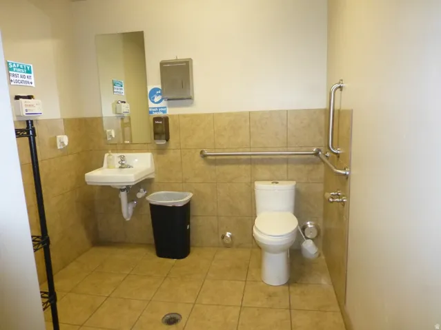 Unit D Ceramic tile flooring with coordinating wall tiling