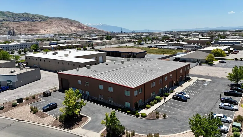 Industrial building with a brick facade and a metal roof