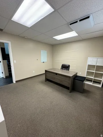 Unit D- Acoustic panel ceiling with integrated fluorescent lighting and climate control unit