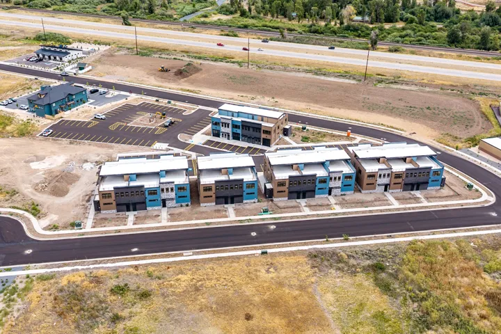 Modern residential development featuring multiple townhome-style units