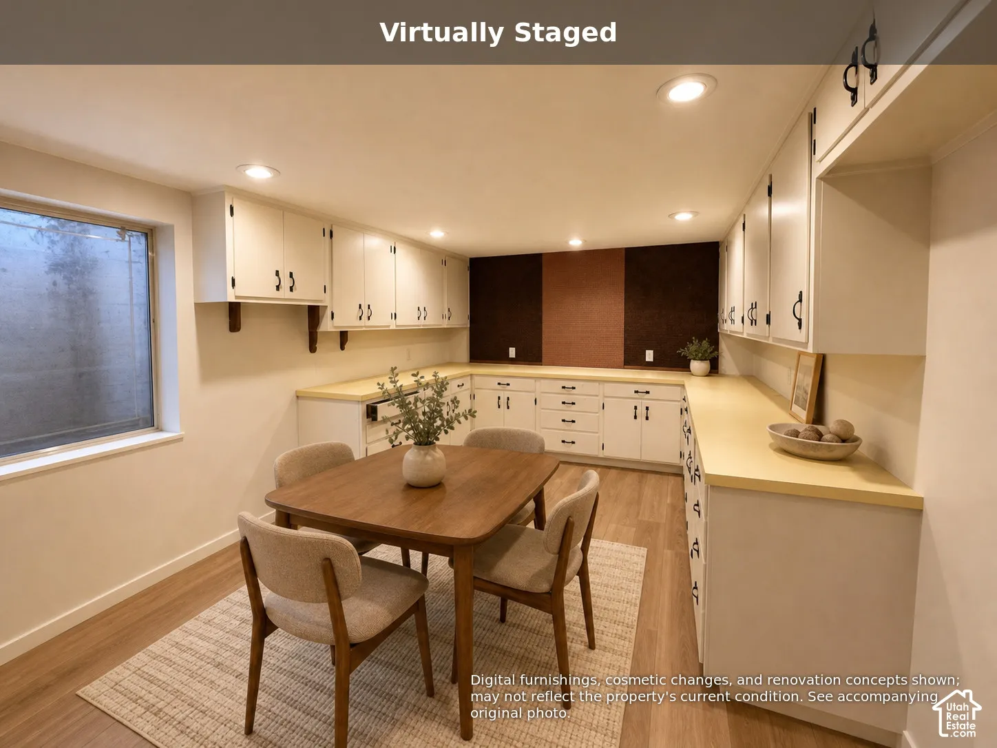 Extensive built-in cabinetry featuring white shaker-style doors, solid-surface countertops, recessed lighting, and wood-finish flooring