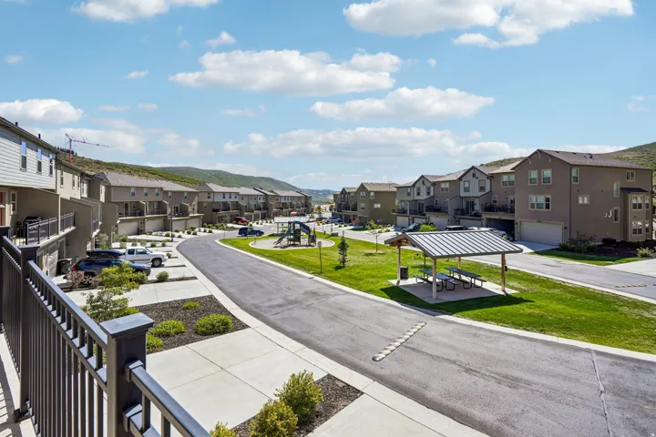 Townhome community featuring paved roadways and sidewalks