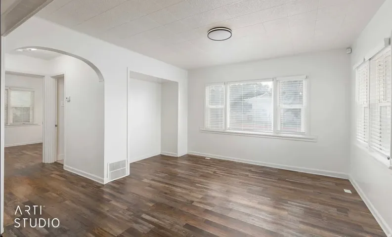 Wood-finish flooring with white walls
