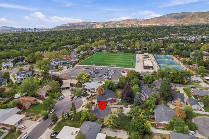 Property set within a residential neighborhood with mature trees