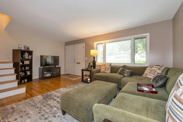 Hardwood flooring throughout, bright windows