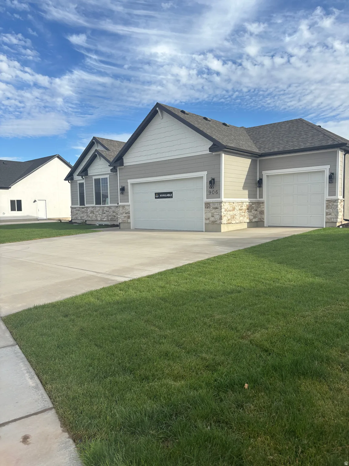 Exterior featuring 3rd car garage