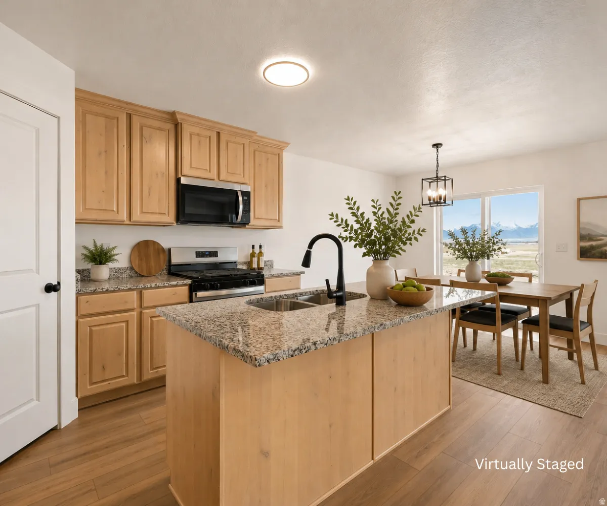 Wood-finish flooring, light wood cabinetry, granite countertops, stainless steel appliances, and a sliding glass door