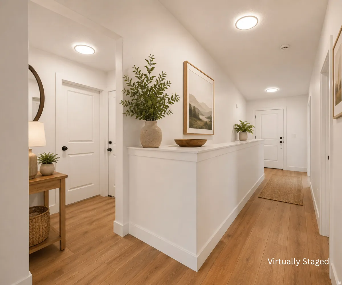 Recessed ceiling lighting, wood-finish flooring, white paneled doors, and white walls
