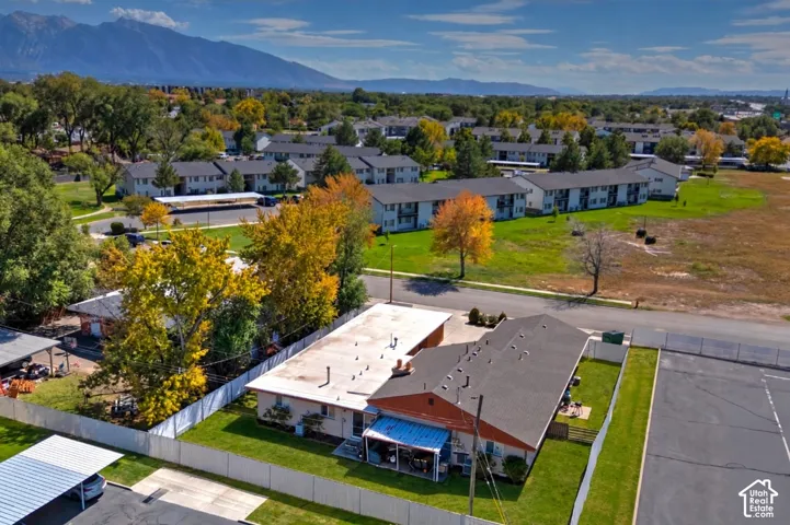 Multi-unit residential property with pitched and flat rooflines