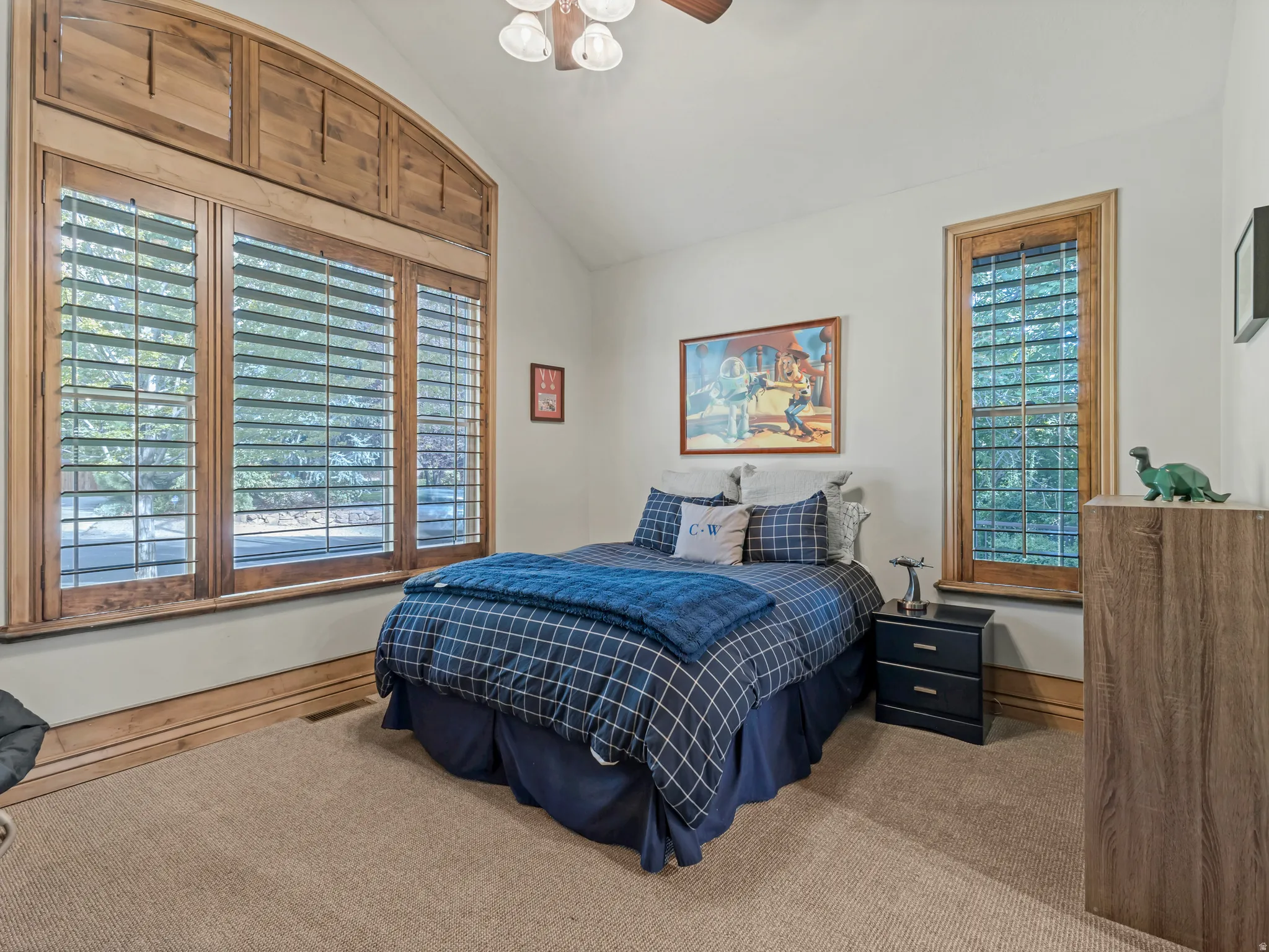 Main floor bedroom with tons of natural light and large customized closet