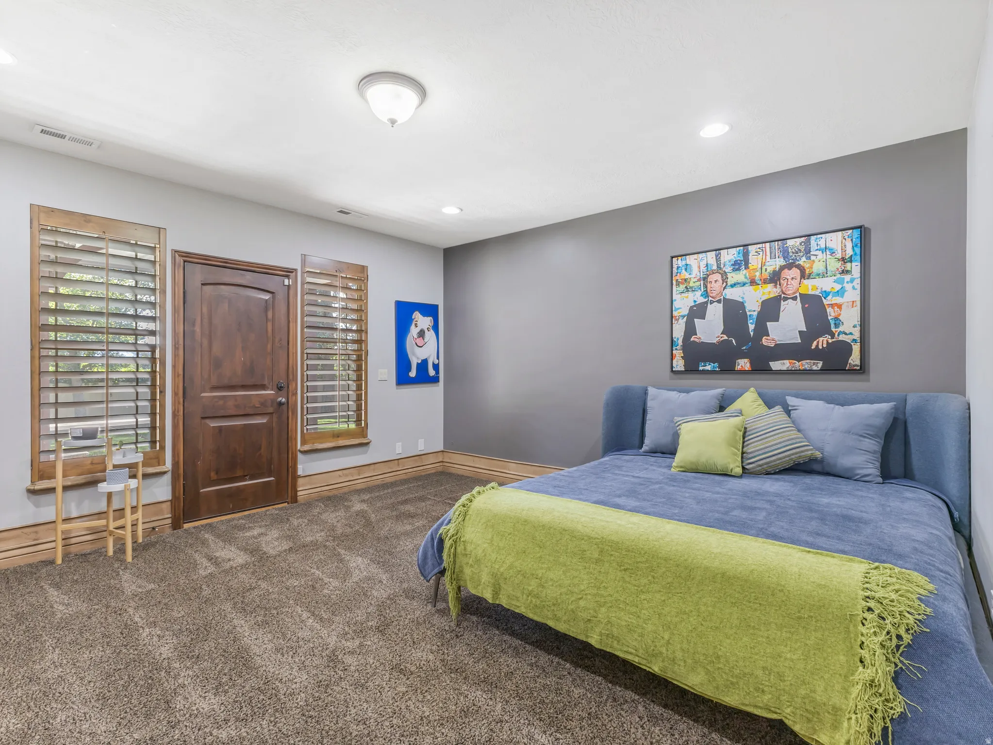 Second primary suite with attached bath and walk-in closet