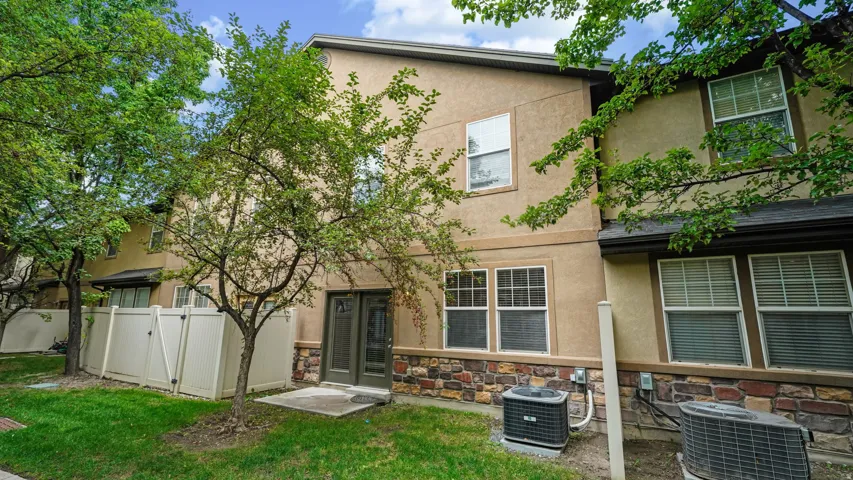 Stucco exterior with stone accent detailing