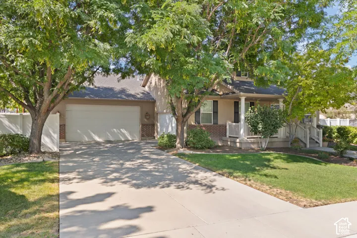 Driveway leading to an attached garage