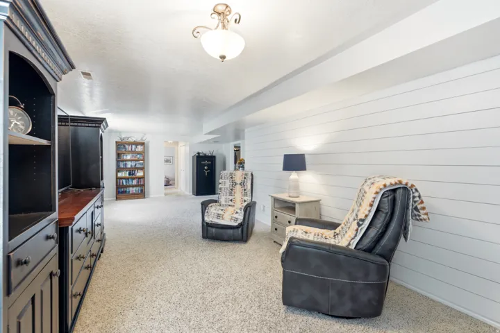 Recessed lighting and a textured ceiling