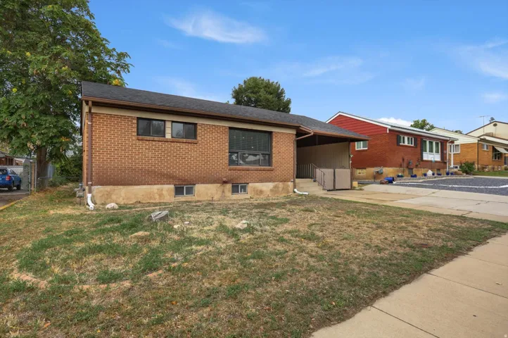 Brick exterior with dark trim windows