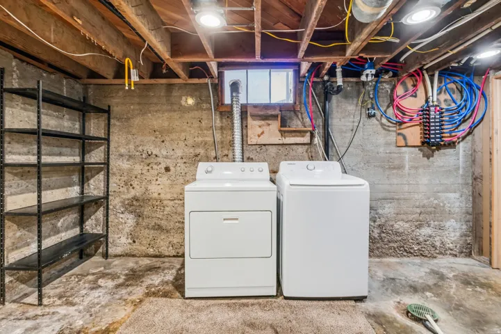 Laundry area with a washer and dryer.