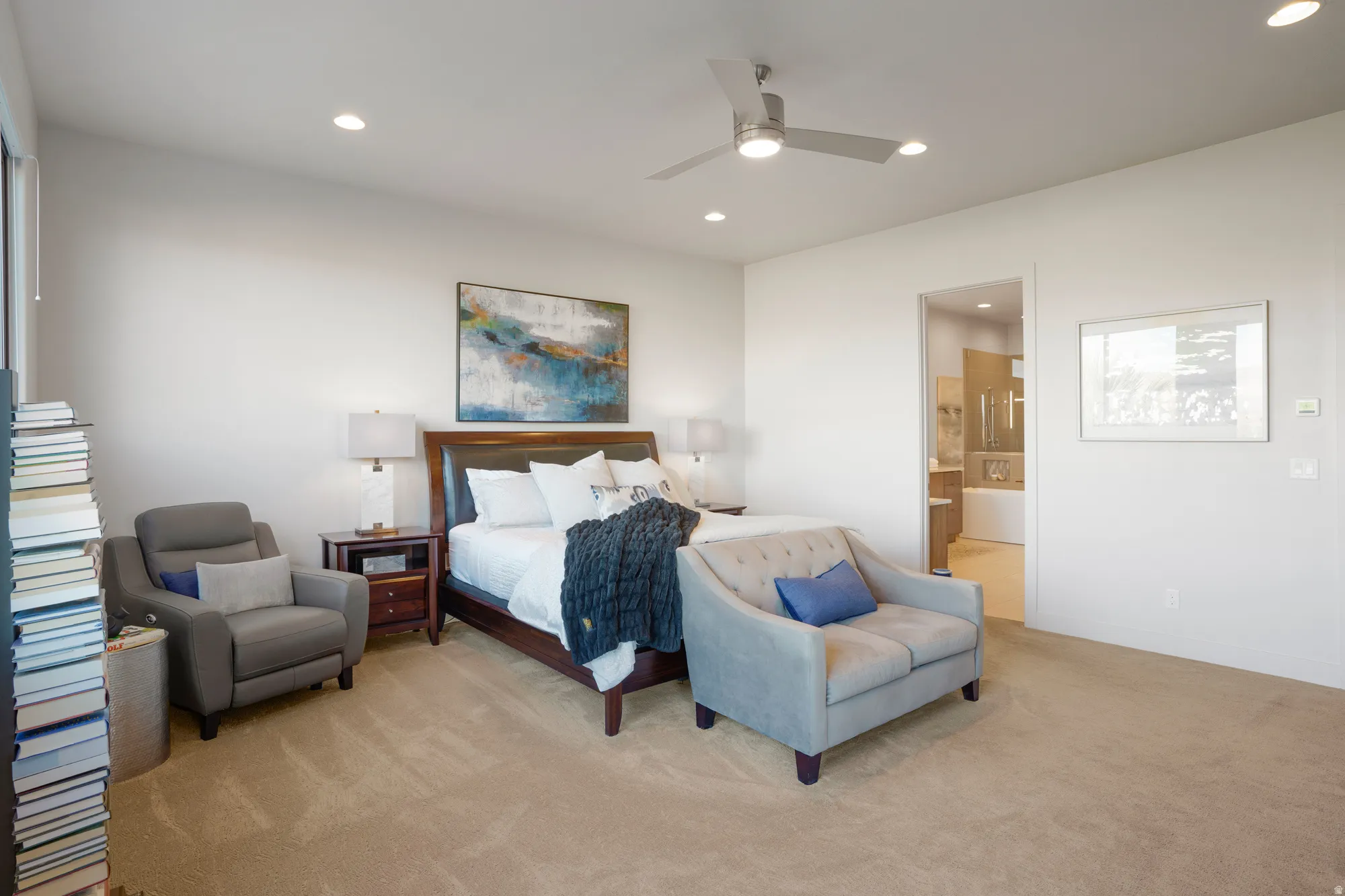 Recessed lighting, ceiling fan, and carpeted flooring