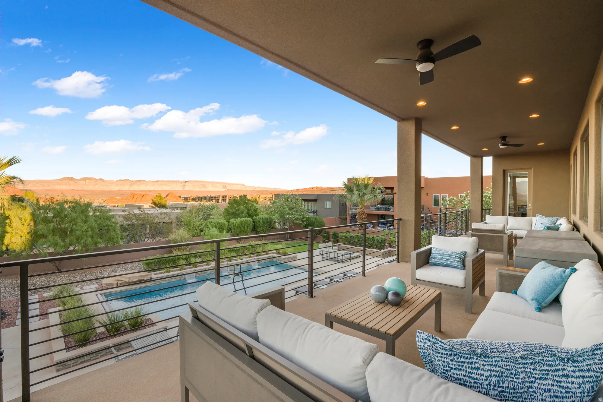 Expansive covered patio with recessed lighting and ceiling fans