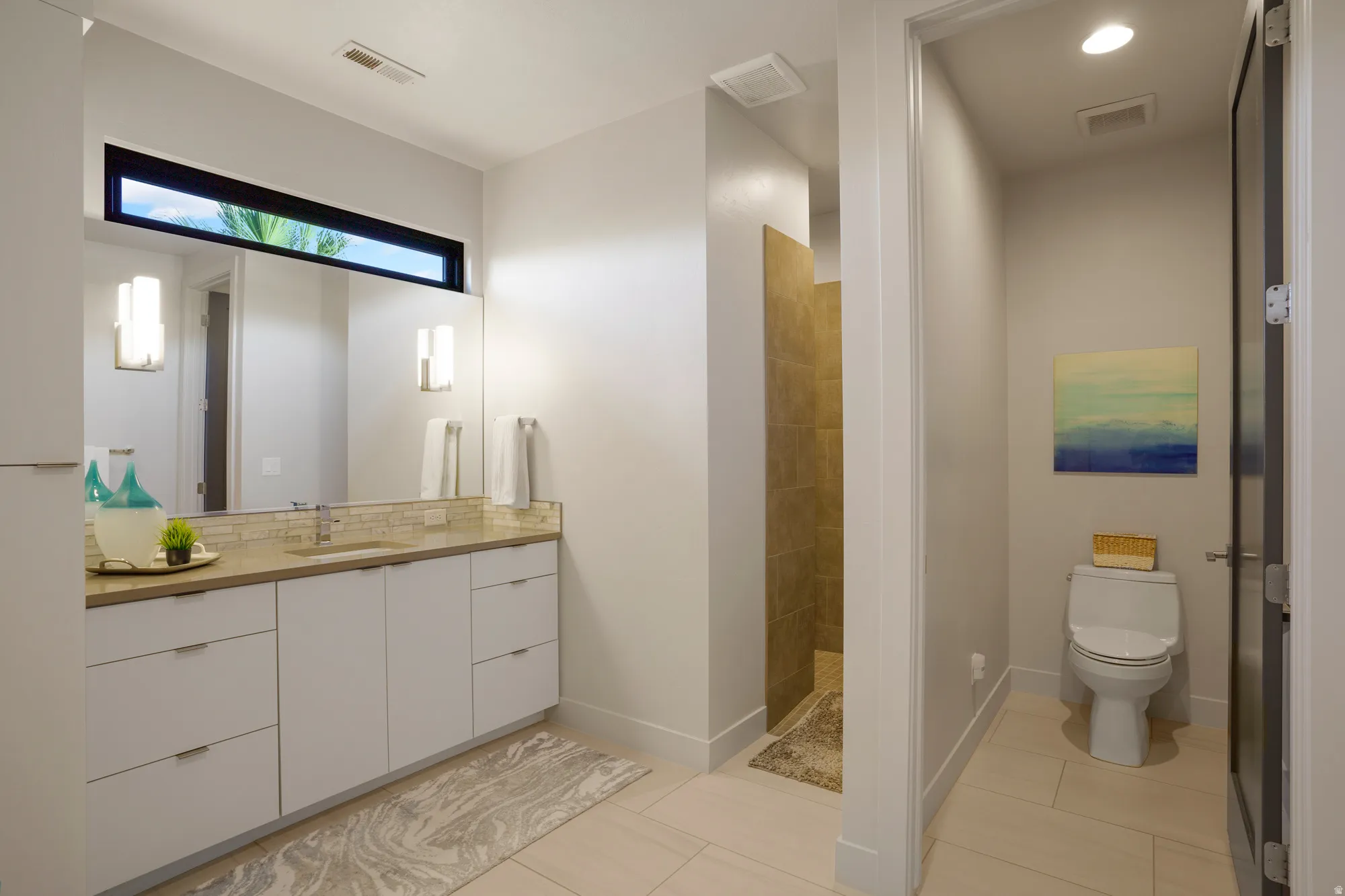 Full-width vanity with dual sinks and ample storage