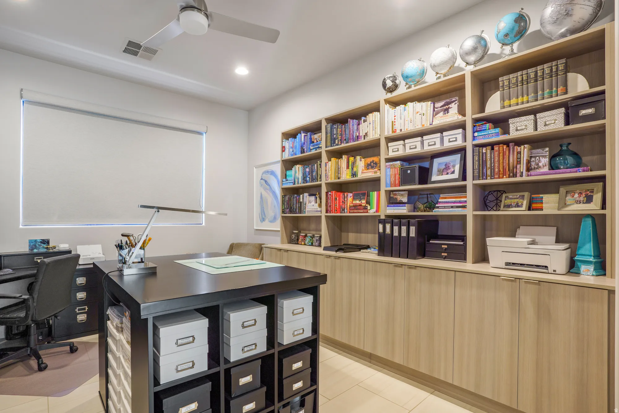 Built-in shelving and cabinetry provide extensive storage