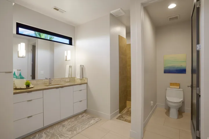 Full-width vanity with dual sinks and ample storage