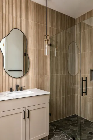 Bathroom vanity with a white countertop and rectangular sink