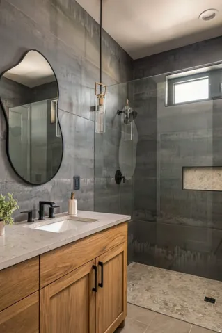 Wood-finish vanity with an integrated sink, light-toned countertop, and matte black fixtures