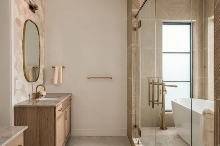 Custom vanity with natural wood finish and stone countertop