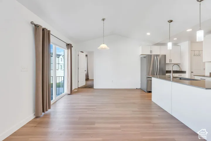 Dining space to be in the center of it all, sliding glass door opens onto large patio and fully fenced backyard.