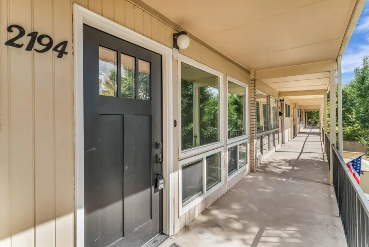Entry door with clear glass lites and dark hardware