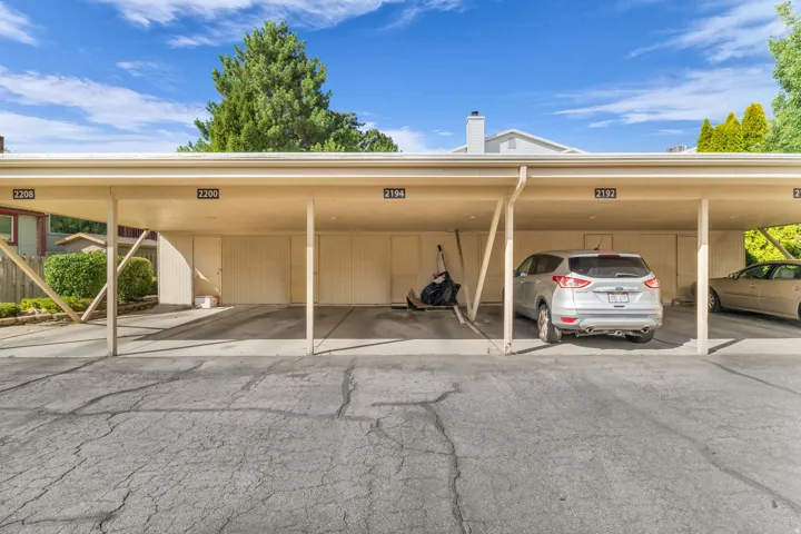 Covered parking structure with designated spaces
